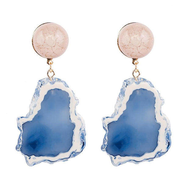 Charismatische lange Tropfenohrringe aus Kunstharz