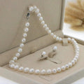 Charmantes Perlen-Halsband und Ohrringe-Schmuckset
