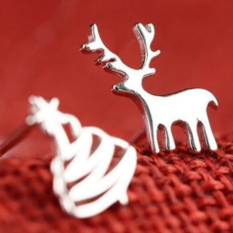 Asymmetrische Ohrringe mit Weihnachtsmann-Motiv