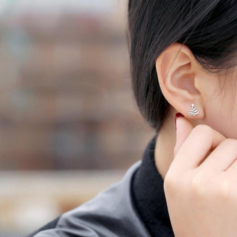 Asymmetrische Ohrringe mit Weihnachtsmann-Motiv