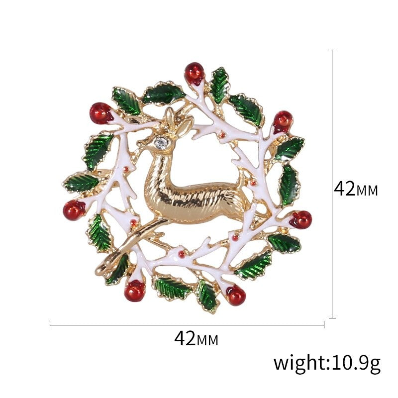 Emaille-Brosche mit weihnachtlichem Motiv aus Stoff