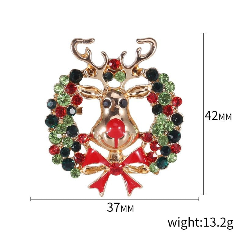 Emaille-Brosche mit weihnachtlichem Motiv aus Stoff