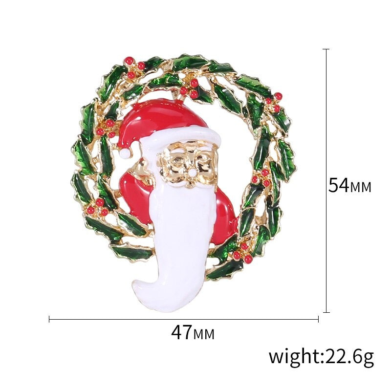 Emaille-Brosche mit weihnachtlichem Motiv aus Stoff