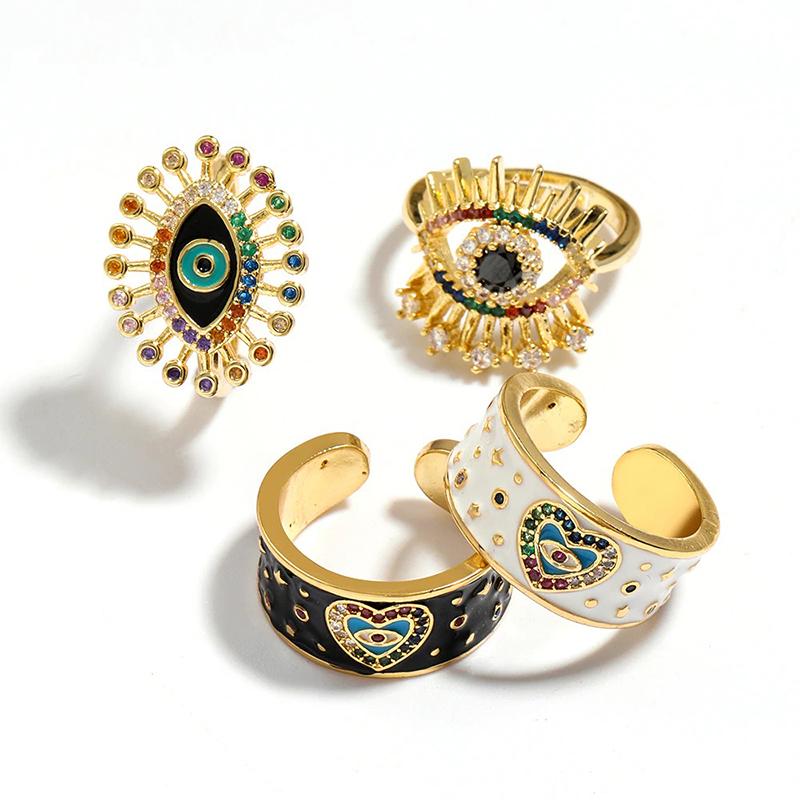 Bunte Strasssteine mit Glücksaugen-Ringen
