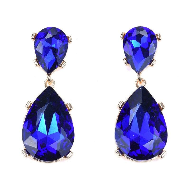 Lange, mit bunten Strasssteinen besetzte Tropfenohrringe