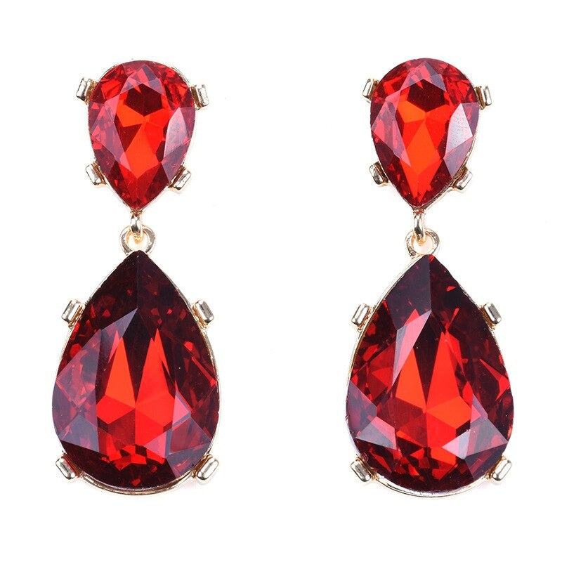 Lange, mit bunten Strasssteinen besetzte Tropfenohrringe