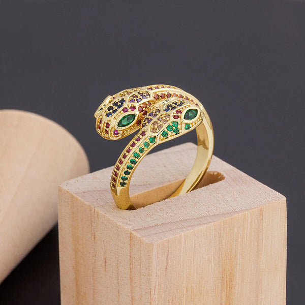 Bunte, mit Zirkonen besetzte, verstellbare Ringe in Schlangenform