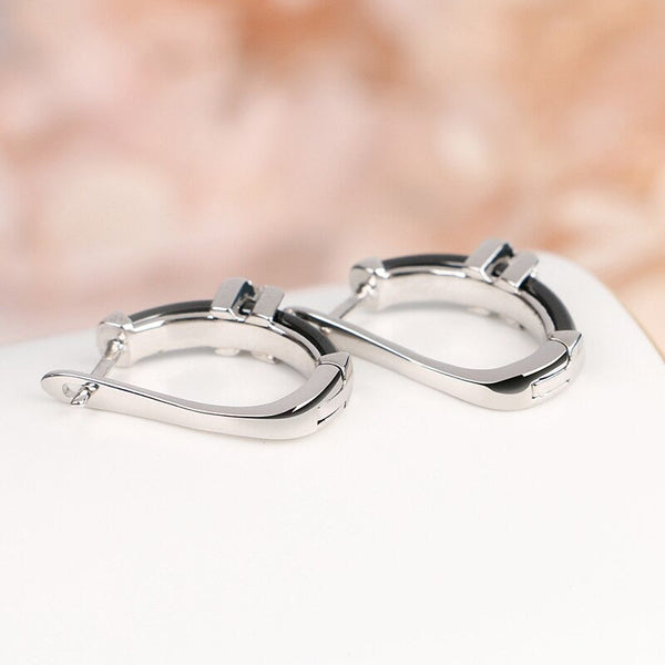 U-förmige Clip-Ohrringe aus Keramik mit Kreuz und X-Strassverzierung