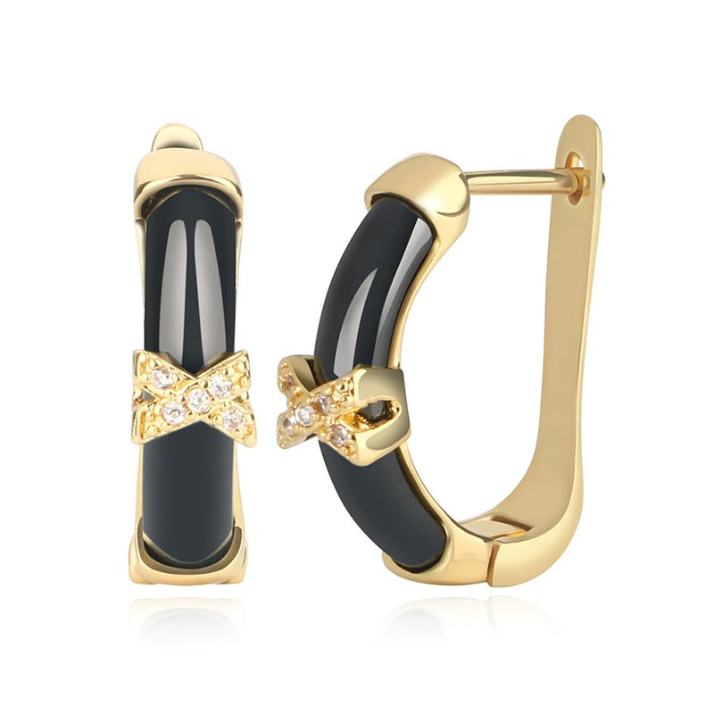 U-förmige Clip-Ohrringe aus Keramik mit Kreuz und X-Strassverzierung