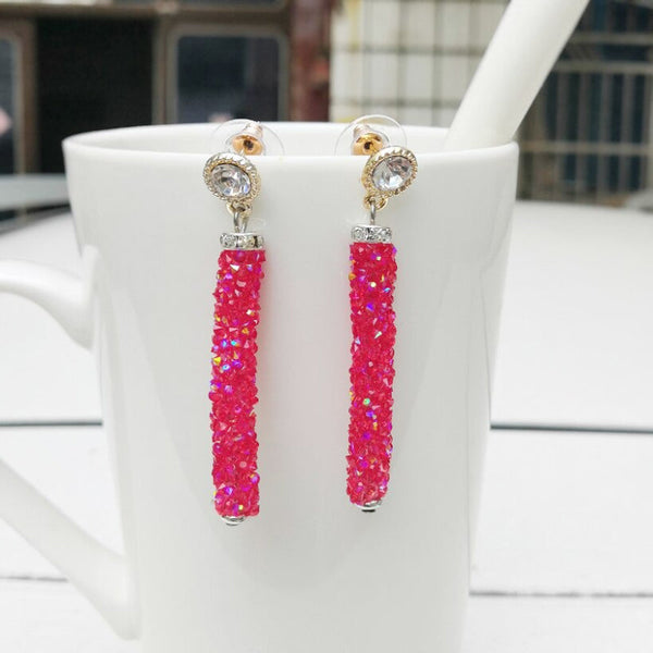 Zylinderförmige Tropfenohrringe mit Strassbesatz