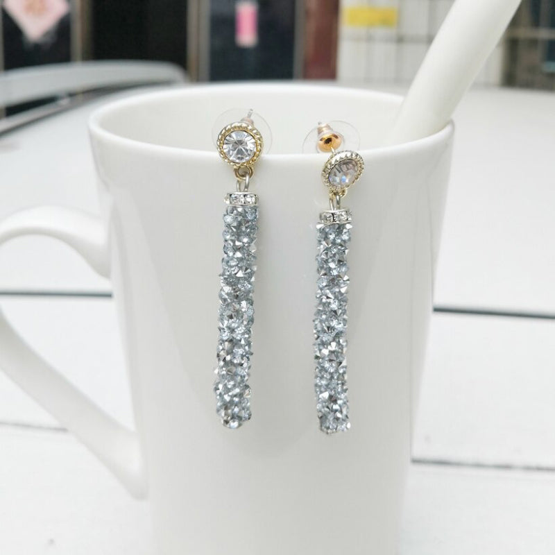 Zylinderförmige Tropfenohrringe mit Strassbesatz