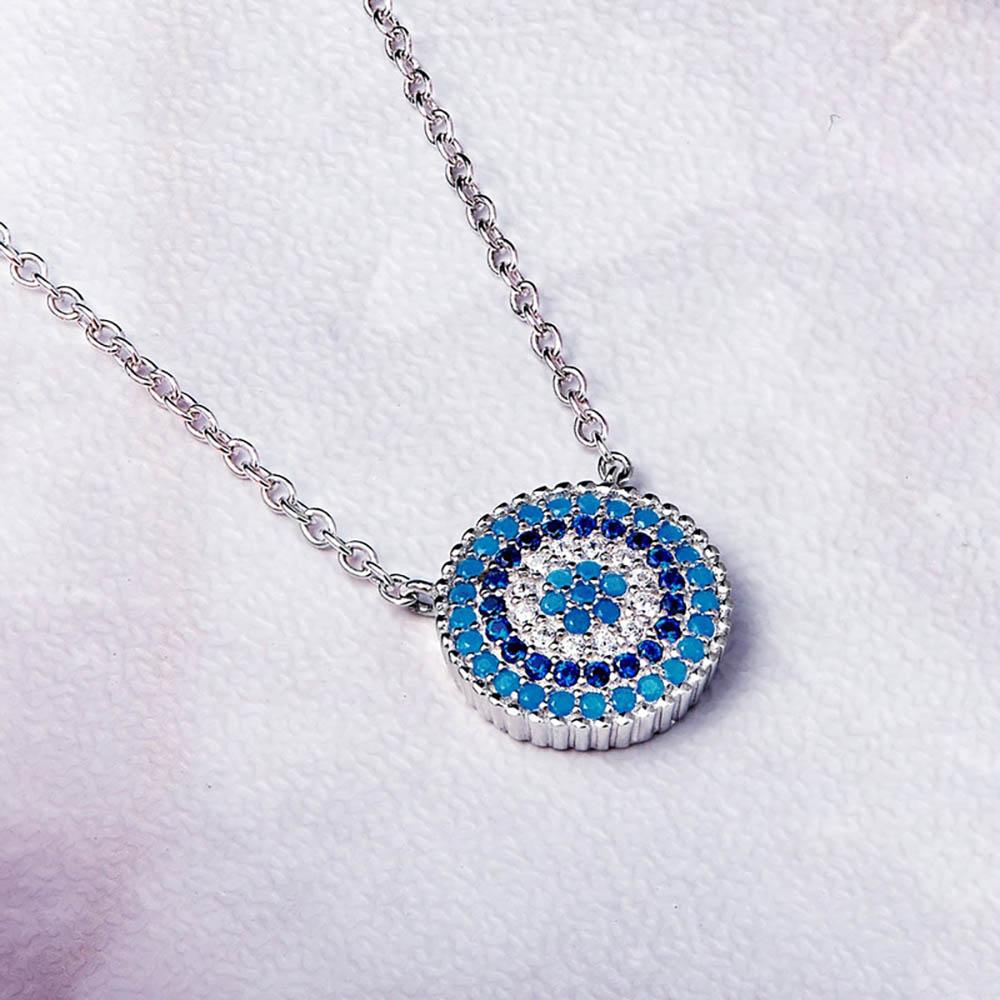 Schillernde blaue Halskette mit rundem Auge-Strass-Anhänger