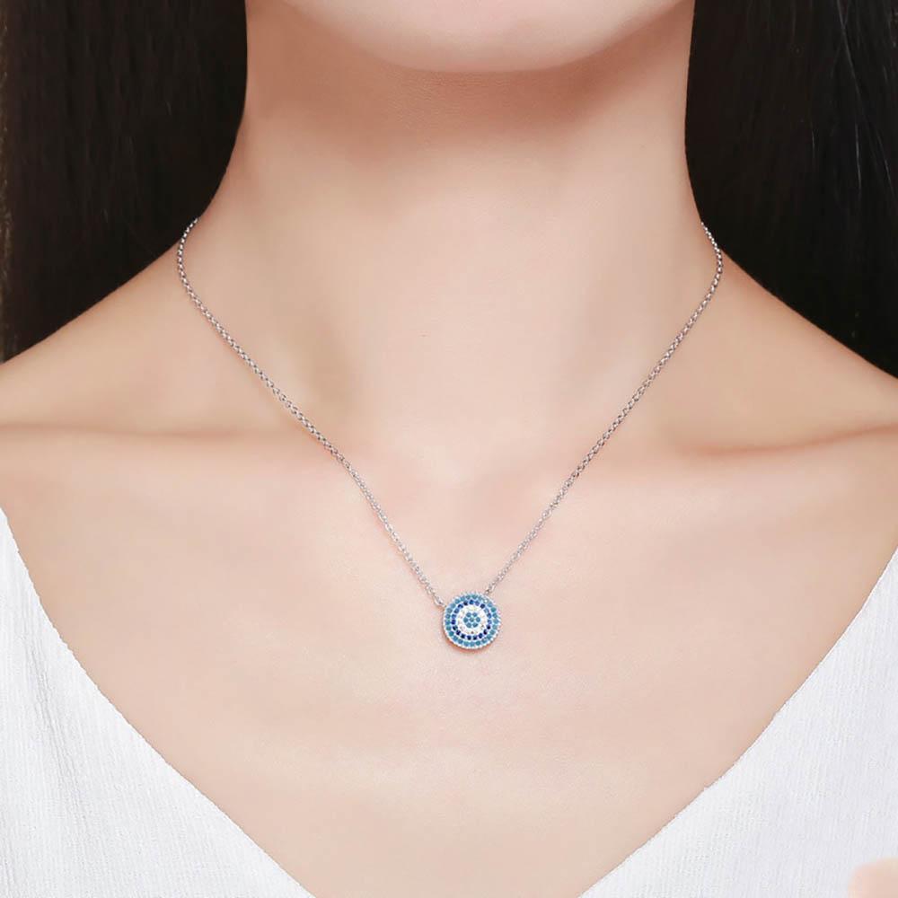 Schillernde blaue Halskette mit rundem Auge-Strass-Anhänger