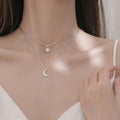 Doppelte Kette mit Mond- und Stern-Zirkon-Anhänger