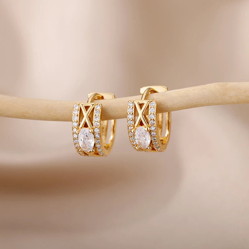 Kollektion zierlicher Creolen aus Edelstahl mit Herz-Zirkon