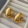 Ovale Tropfenohrringe mit gold-, rhodinierter und silberfarbener Beschichtung