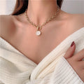 Edgy Fashion Dicke Kette mit runden Muschelanhängern