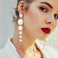 Elegante und atemberaubende lange Perlenohrringe