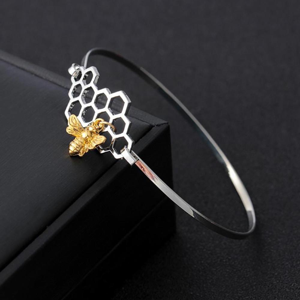 Eleganter Armreif mit Bienenstock-Gliederkette