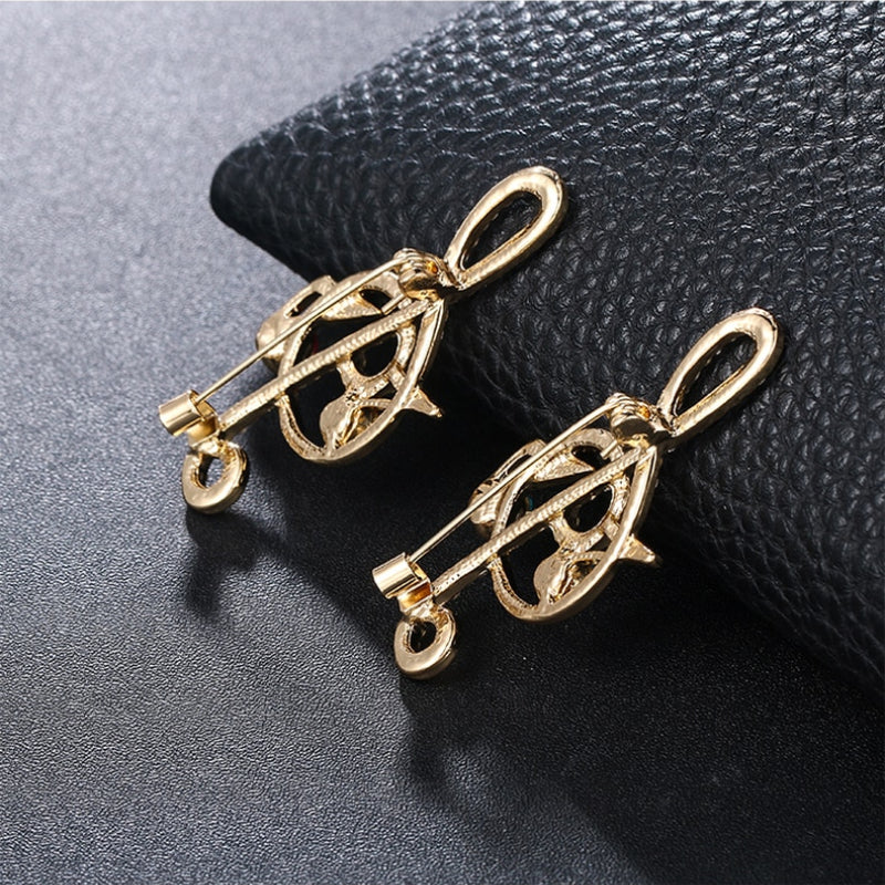 Elegante mit Strasssteinen und Perlen verzierte Broschennadeln mit Musikzeichen