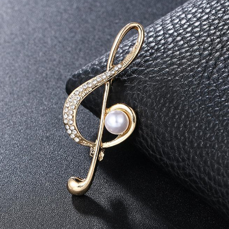 Elegante mit Strasssteinen und Perlen verzierte Broschennadeln mit Musikzeichen