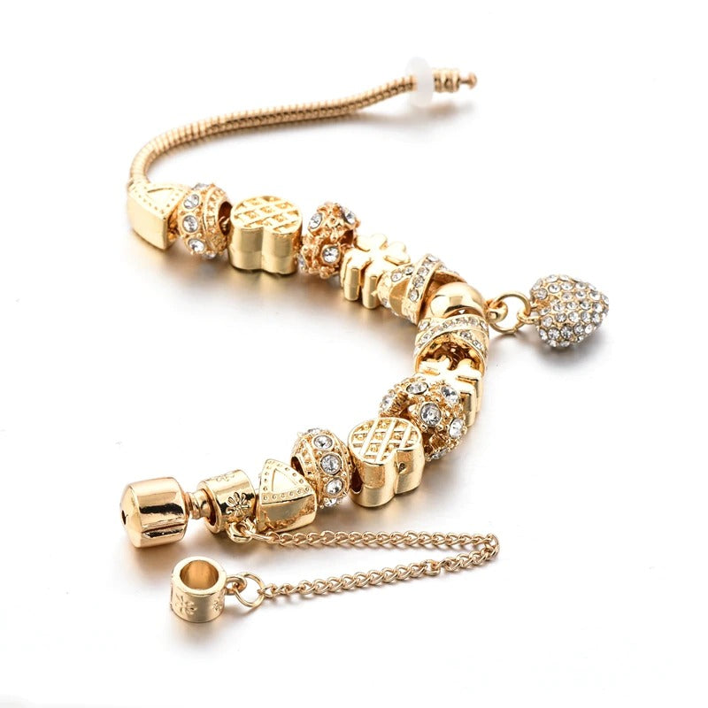 Bezaubernde Charm-Armbänder mit Herz aus Gold und Strasssteinen