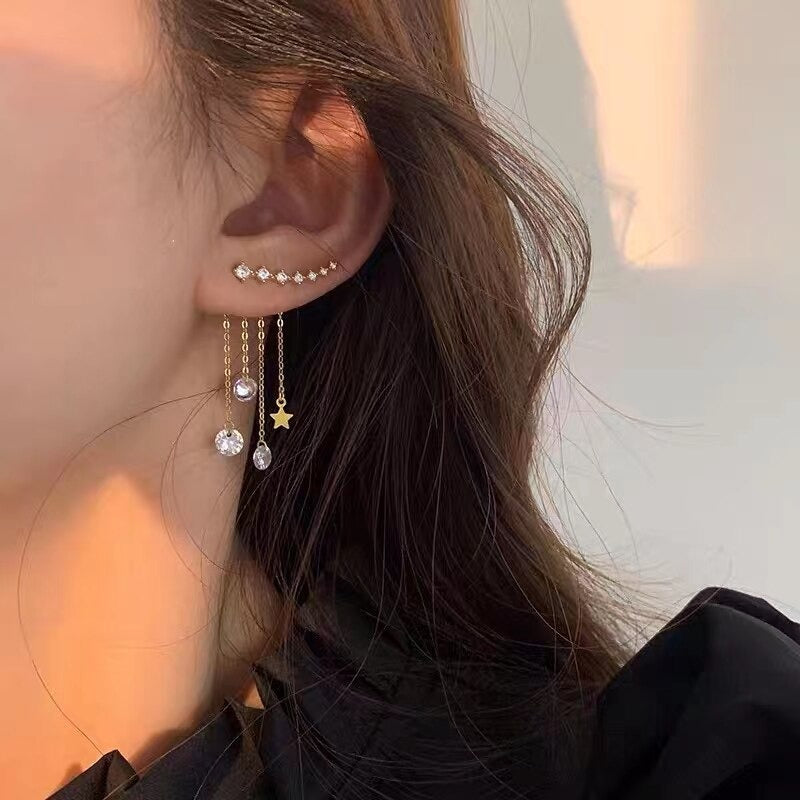 Exquisite, mit Strasssteinen besetzte Ohrringe mit Sternquaste