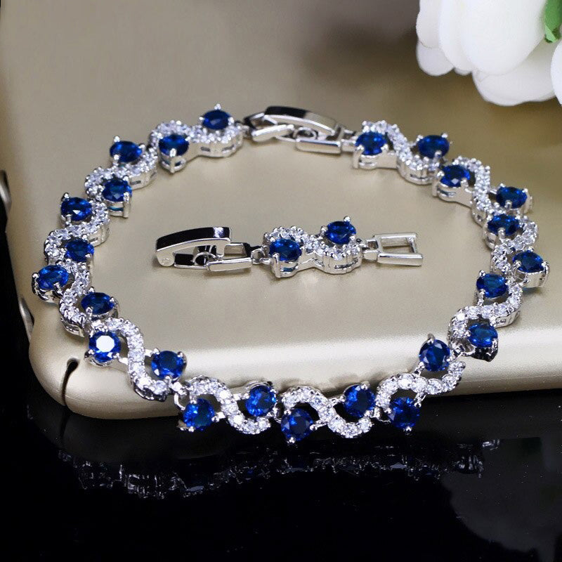 Extravagante mehrfarbige mit Zirkonen verzierte Infinity-Armbänder