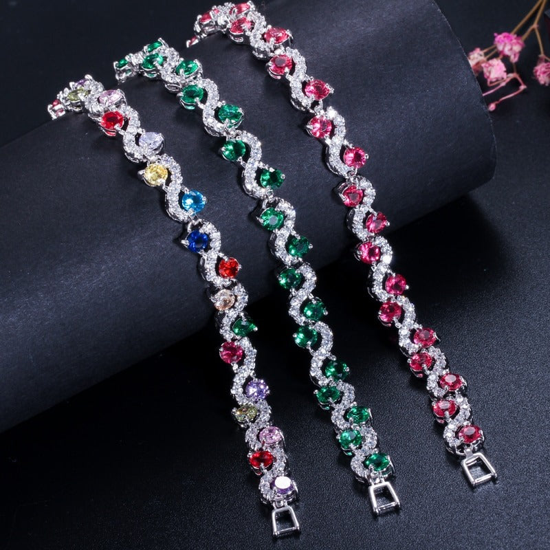 Extravagante mehrfarbige mit Zirkonen verzierte Infinity-Armbänder