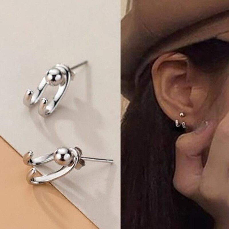 Modekollektionen von Tropfenohrringen mit Strasssteinen und Perlenquasten