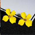Modische, süße Ohrstecker mit Blumenmuster