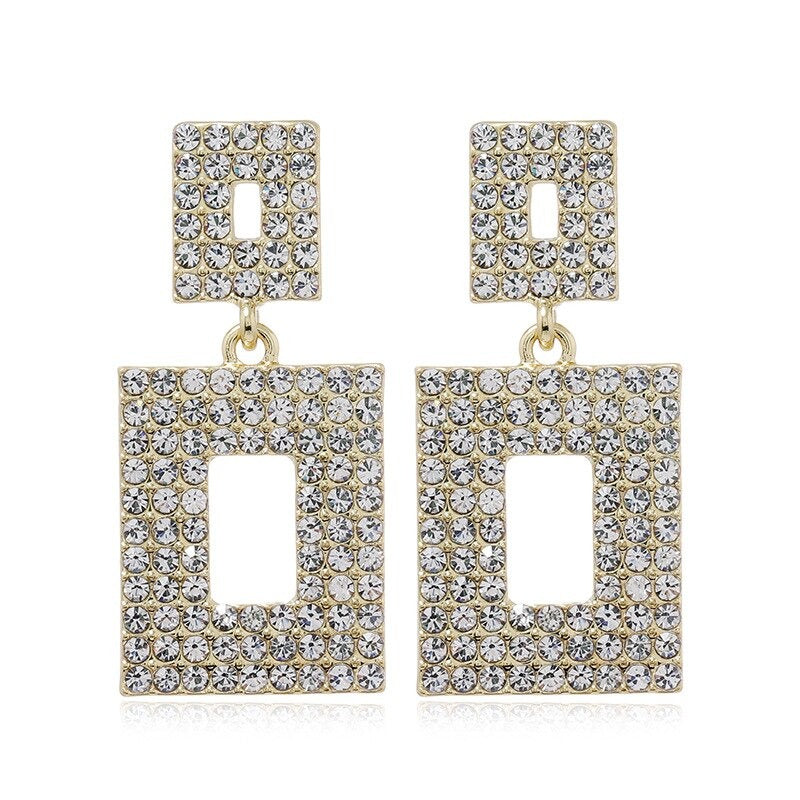 Modische, trendige, lange Ohrringe mit Quaste und Strasssteinen