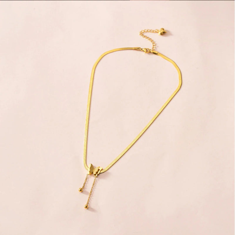 Flache Schlangenkette mit Quaste und Schmetterlingsanhänger