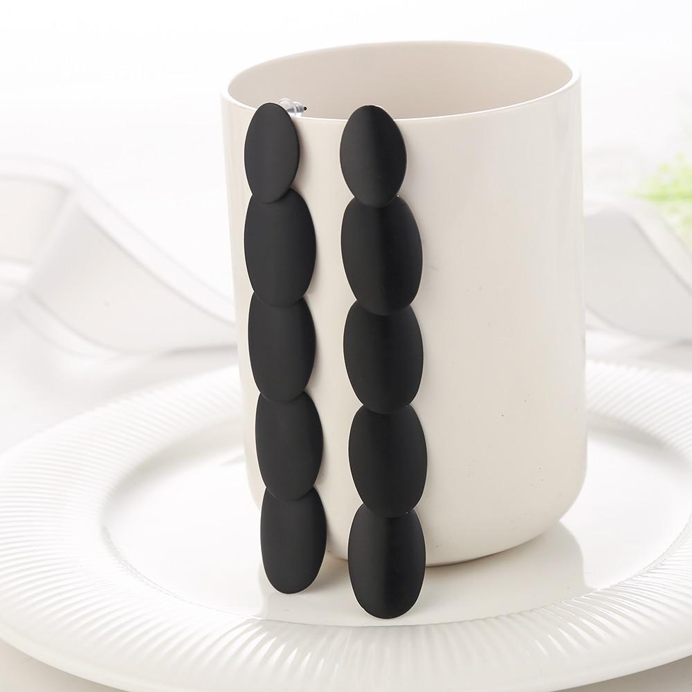 Geometrische Retro-Ohrringe in Schwarz, rund, Tropfenform, Sommerkollektion