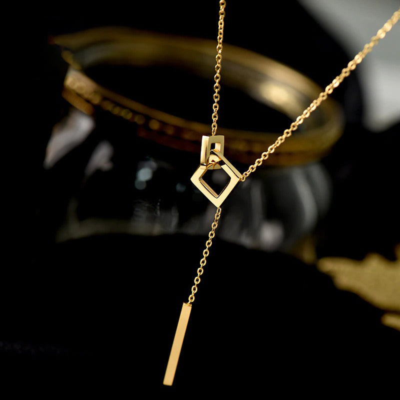 Halsketten im geometrischen Stil mit Y-förmiger doppelter quadratischer Schnalle und Quastenanhänger