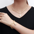 Glamouröse Halskette und Armband mit Herzanhänger und Zirkonia