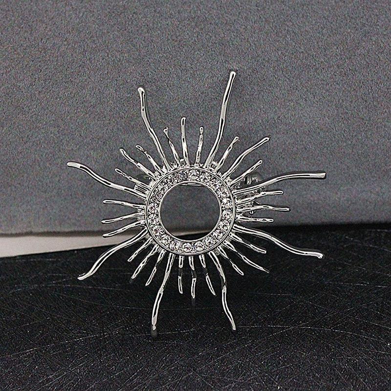 Glänzende Strass-Starburst-Schmuckbrosche