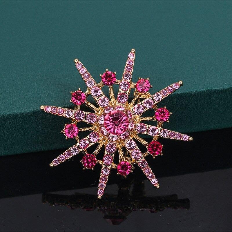 Glänzende Strass-Starburst-Schmuckbrosche