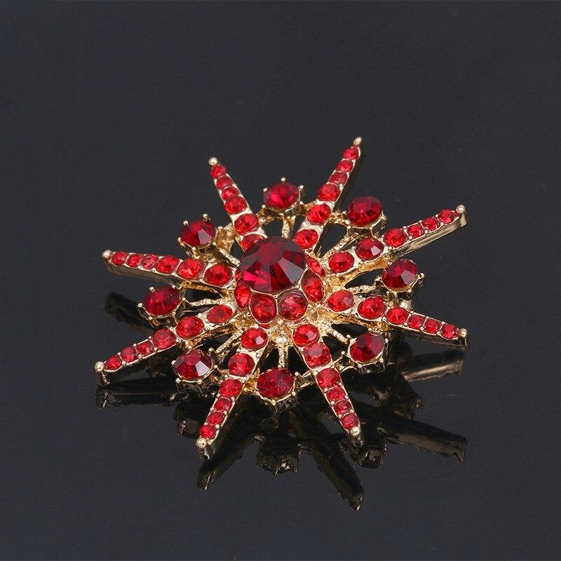 Glänzende Strass-Starburst-Schmuckbrosche
