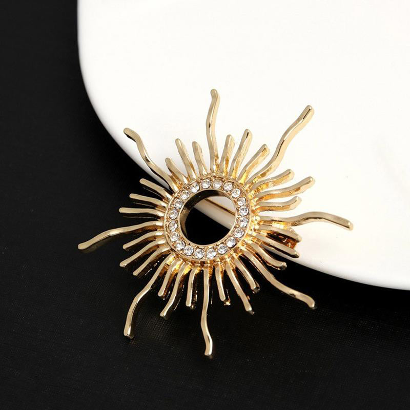 Glänzende Strass-Starburst-Schmuckbrosche