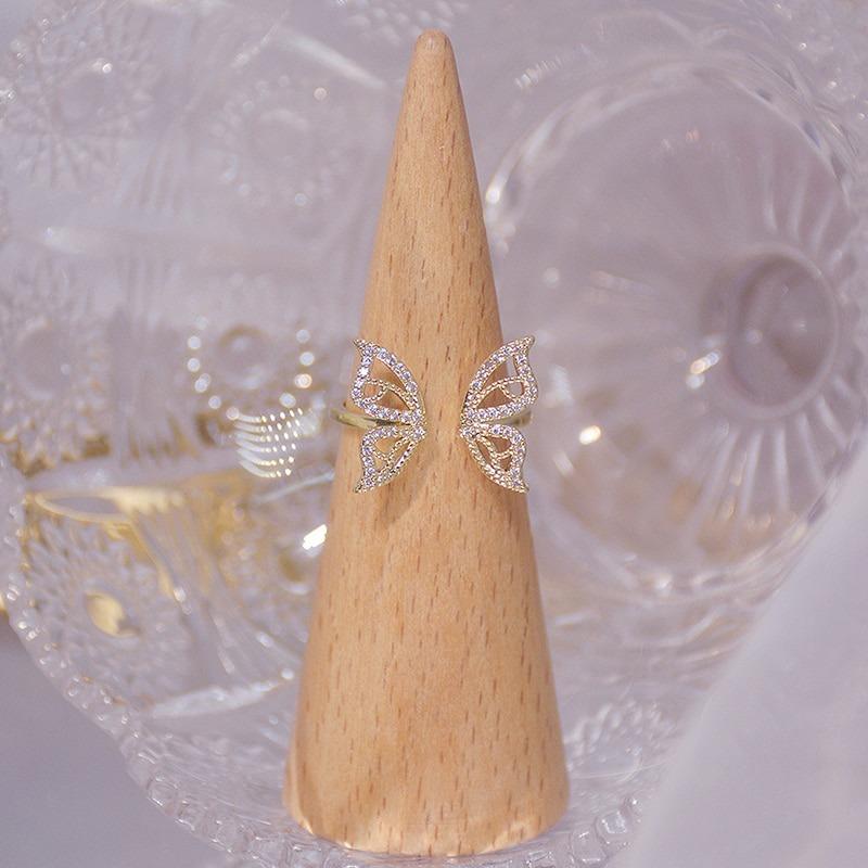 Glitzernde, mit Zirkonen verzierte, offene Schmetterlingsringe