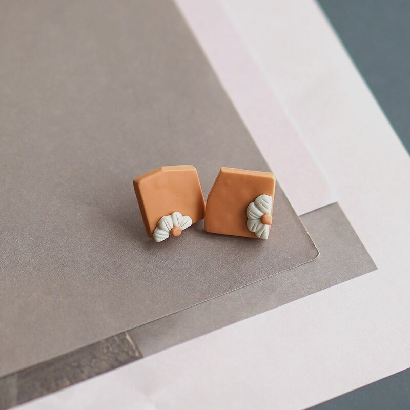 Handgefertigte florale Ohrringe aus Polymer Clay