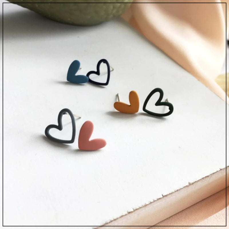 Handgefertigte Ohrstecker mit hohlem Herz