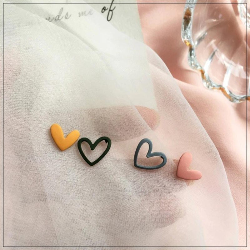 Handgefertigte Ohrstecker mit hohlem Herz