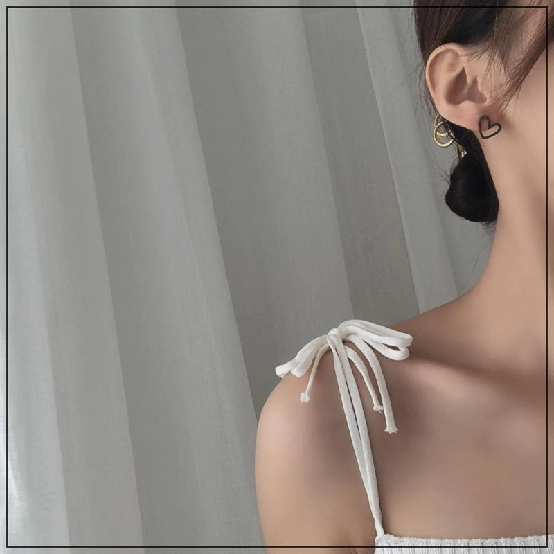 Handgefertigte Ohrstecker mit hohlem Herz