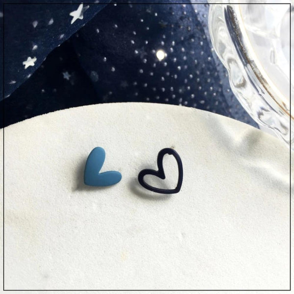 Handgefertigte Ohrstecker mit hohlem Herz