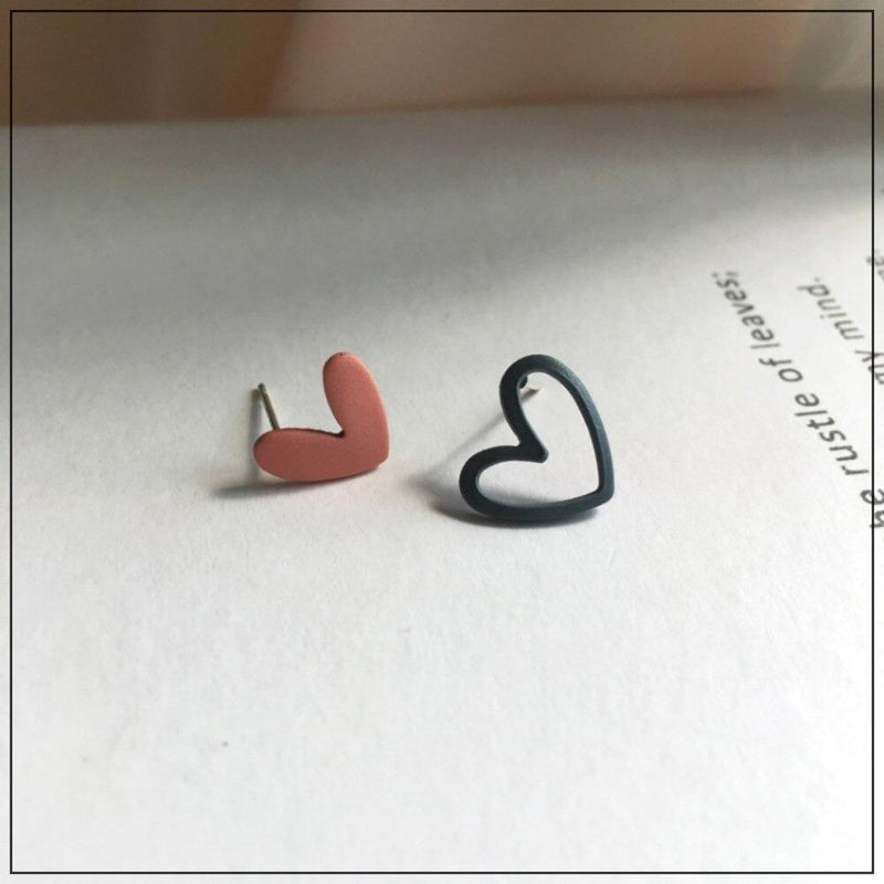 Handgefertigte Ohrstecker mit hohlem Herz