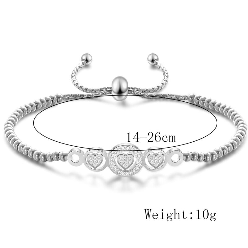 Handgefertigte Armbänder mit Herzanhängern und Strasssteinen