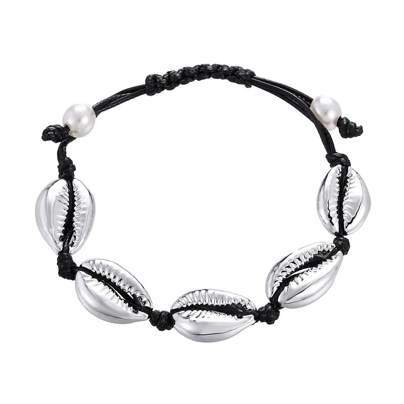 Handgefertigte Boho-Armbänder mit Meeresglanzperlen und Kauri-Muscheln