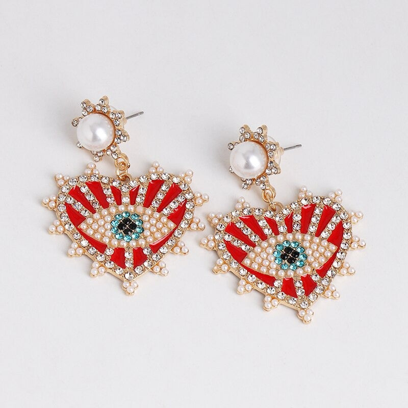 Statement-Ohrringe im Hippie- und Trendy-Stil in Herzform mit Glücksaugen-Tropfen